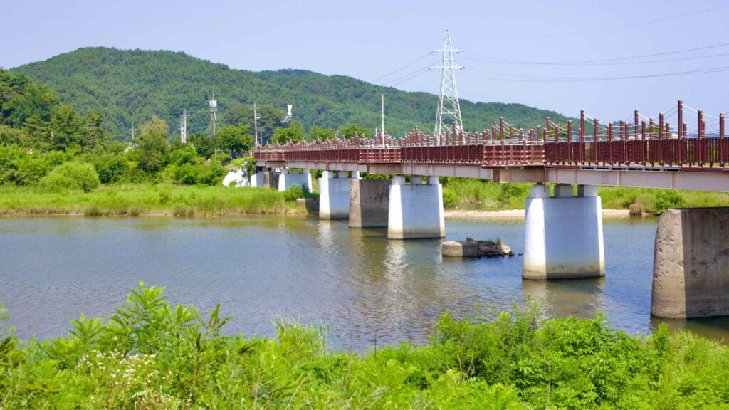 The historic Bukcheon Railway Bridge, spanning a stream flowing into the East Sea, was destroyed during the Korean War, stands as a poignant reminder of tragedy.