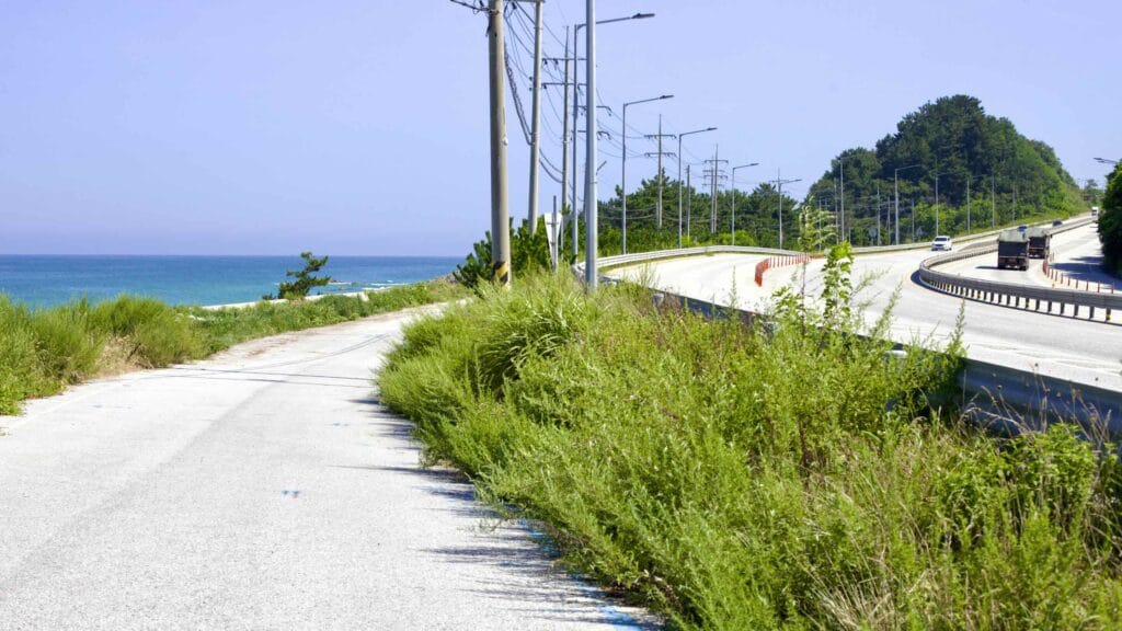 The bike path follows an access road to Mangyang Service Area in Uljin County.