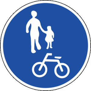 A Korean road sign that with pictures of a bike and pedestrians.