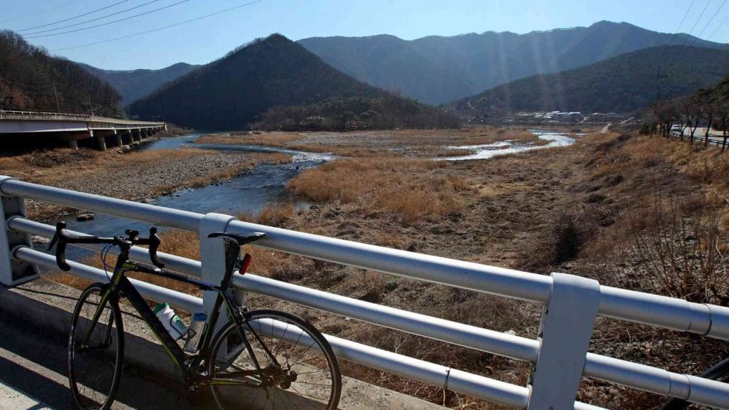 A picture of a stream in Mungyeong City, South Korea along the Saejae Bicycle Path.