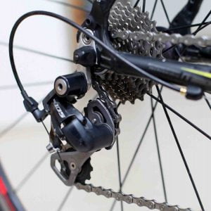 A picture of a rear derailleur on a bicycle.