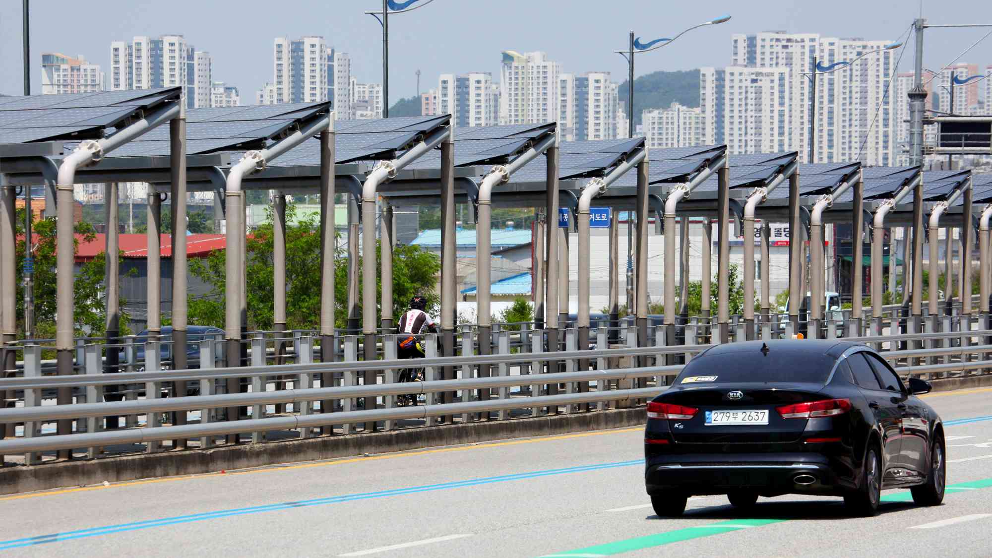 Geumgang Bike Path - Daejeon Buyeo - Solar Panel Highway Biker and Car