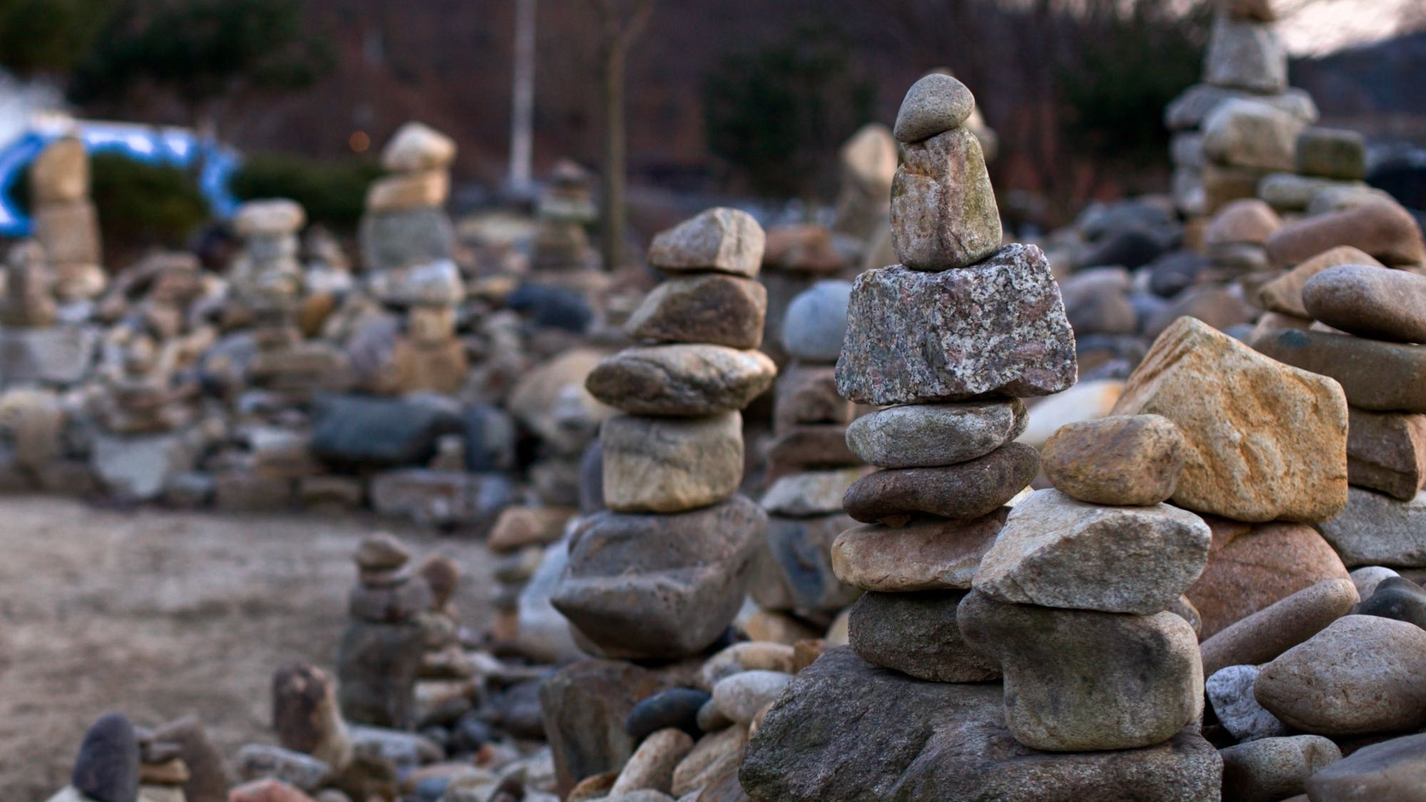 A picture of a stacked stones near the South Han River (남한강) along the Hangang Bike Path (한강자전거길) in Chungju City, South Korea.