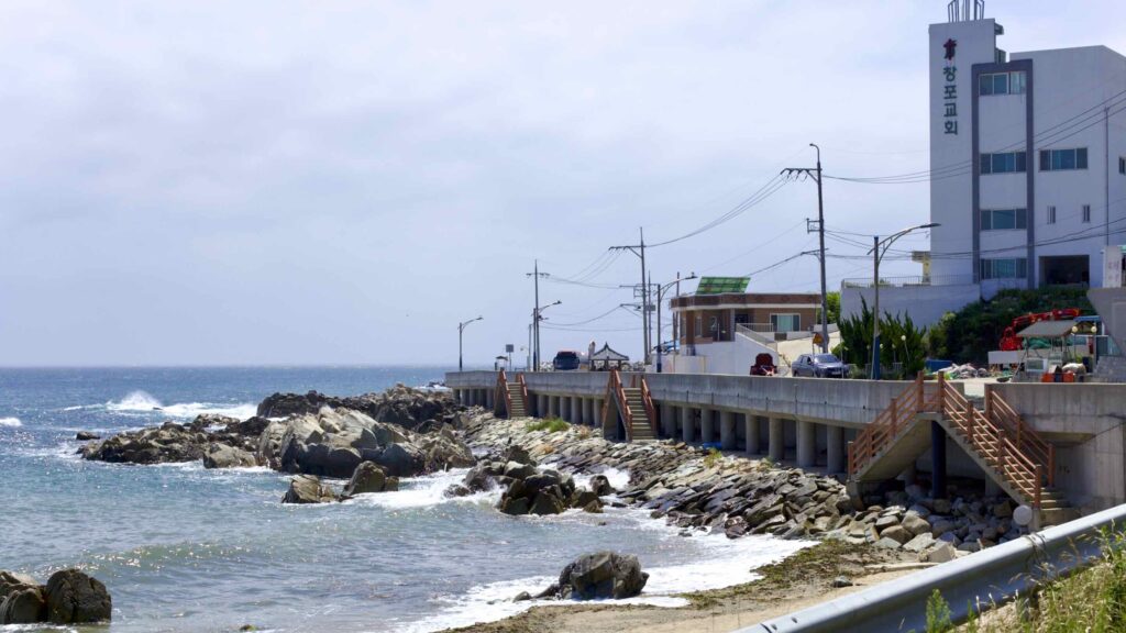 The seawall and buildings in Changdae Port in Yeongdeok County.