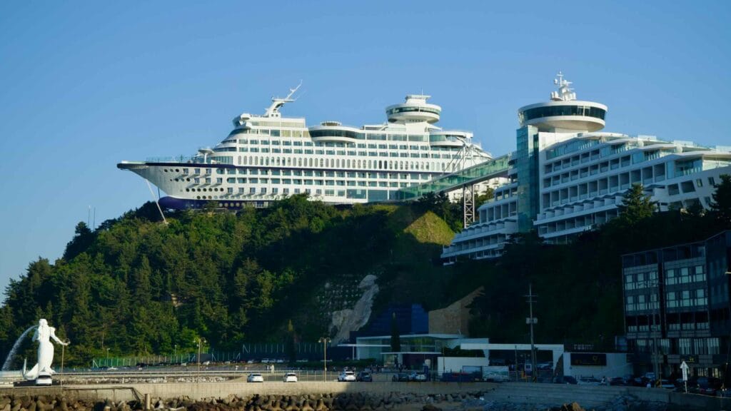 The Sun Cruise Resort, a hotel designed to resemble a cruise ship, stands prominently on a hill in Jeongdongjin, overlooking the East Sea.