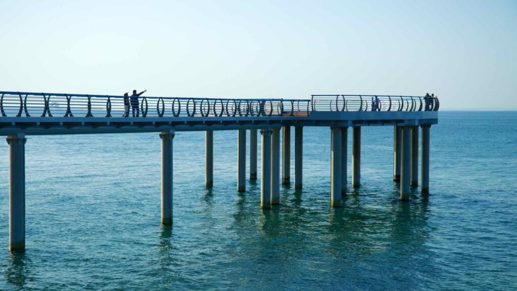 Visitors walking on an observation deck near Sun Cruise Resort in Jeongdongjin.
