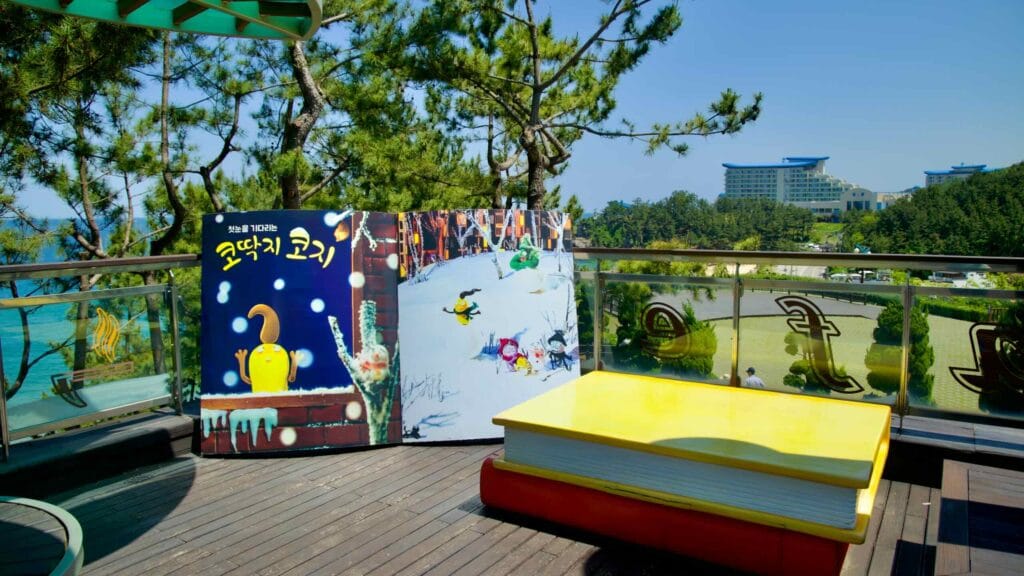An inviting outdoor reading area at Picture Book Land in Isabu Lion Park.