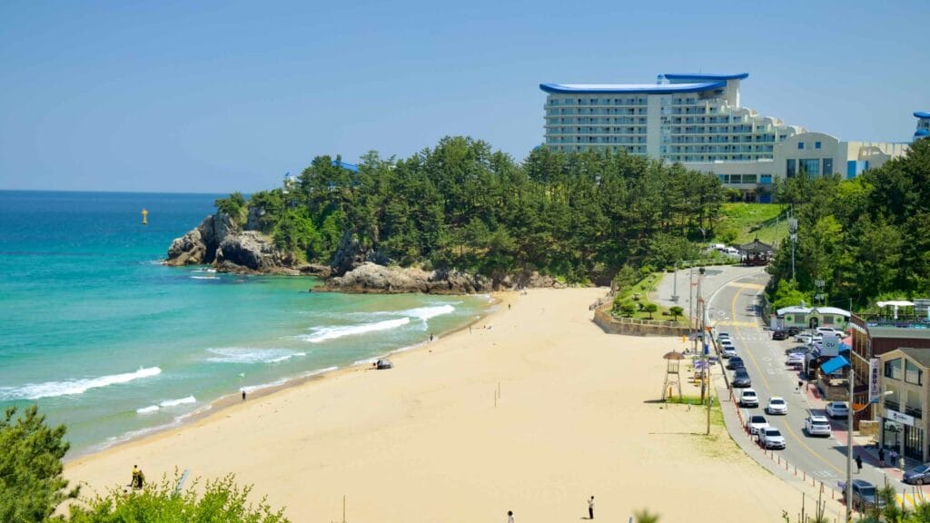 A view of Chuam Beach with Sol Beach Resort in the background, showcasing the beautiful coastline.