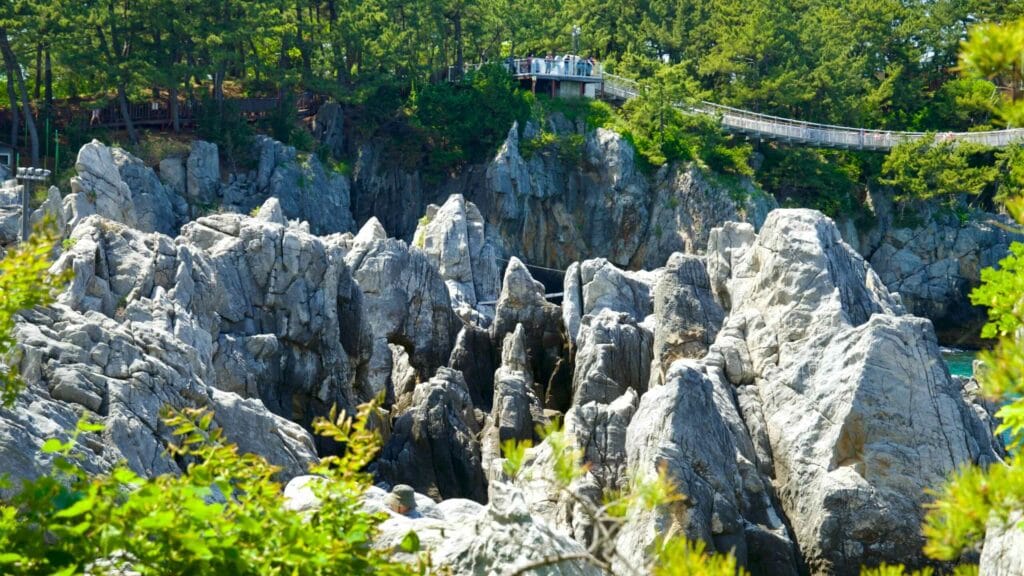 The limestone formations of the Stone Forest near Chuam Candlestick Rock sits near Chuam Suspension Bridge.