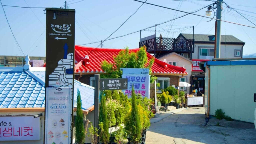 Signs guide visitors along the Lighthouse Uphill Road in Nongoldam Street.