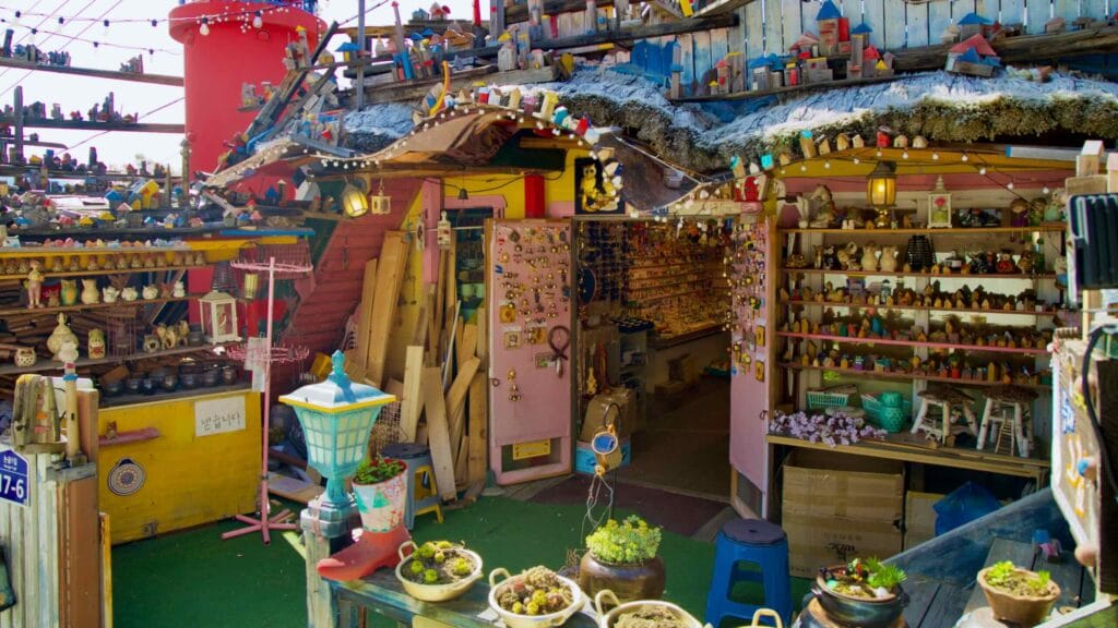 A shop on Nongoldam Street displays a variety of handmade crafts and decorations.