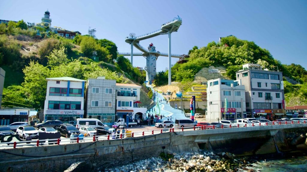 The Dojebigol Sky Valley features an skywalk and a giant spiral slide, towering above the coast.