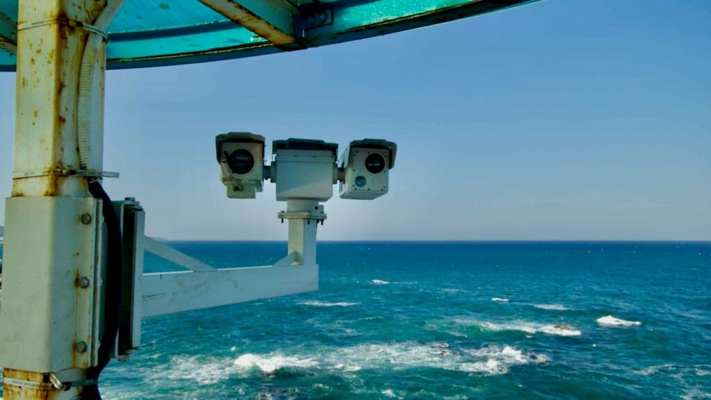 Mounted surveillance cameras at Namae Port Skywalk Observatory overlooking the East Sea ensure safety and provide a panoramic view of the surroundings.