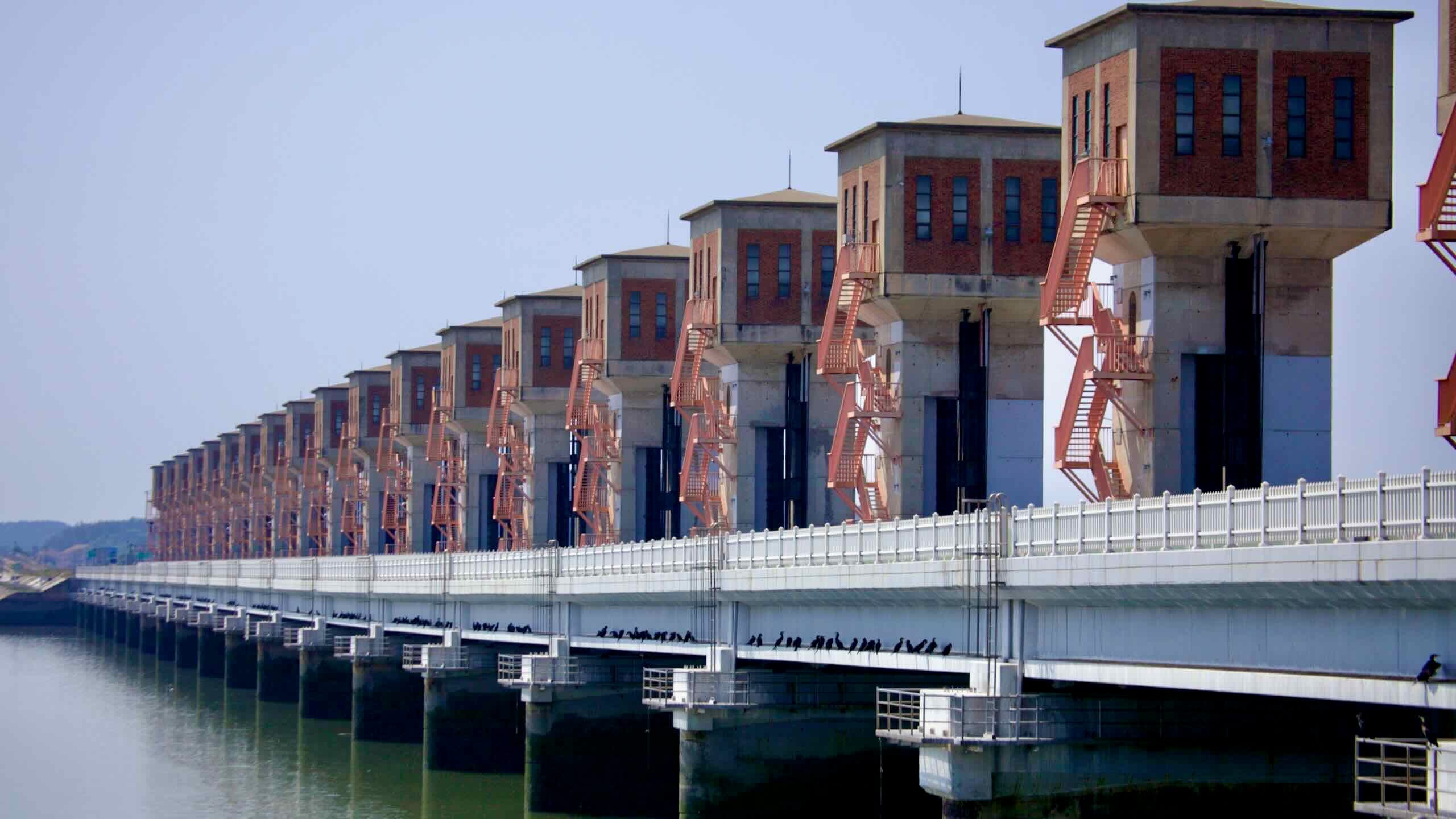 Geum River Estuary Bank with Bird Perch Control towers at the Geum River Estuary Bank, an essential flood control structure.