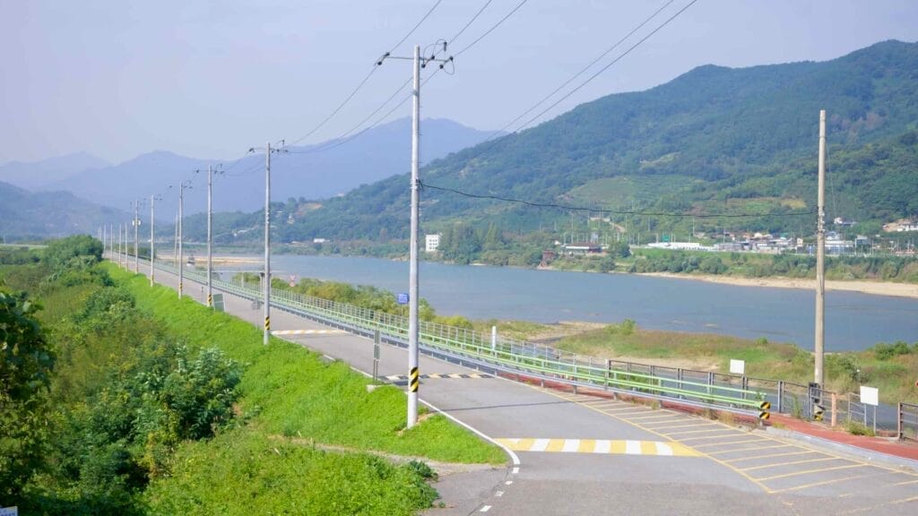 A quiet stretch of the Seomjingang Bike Path runs alongside the Seomjin River.