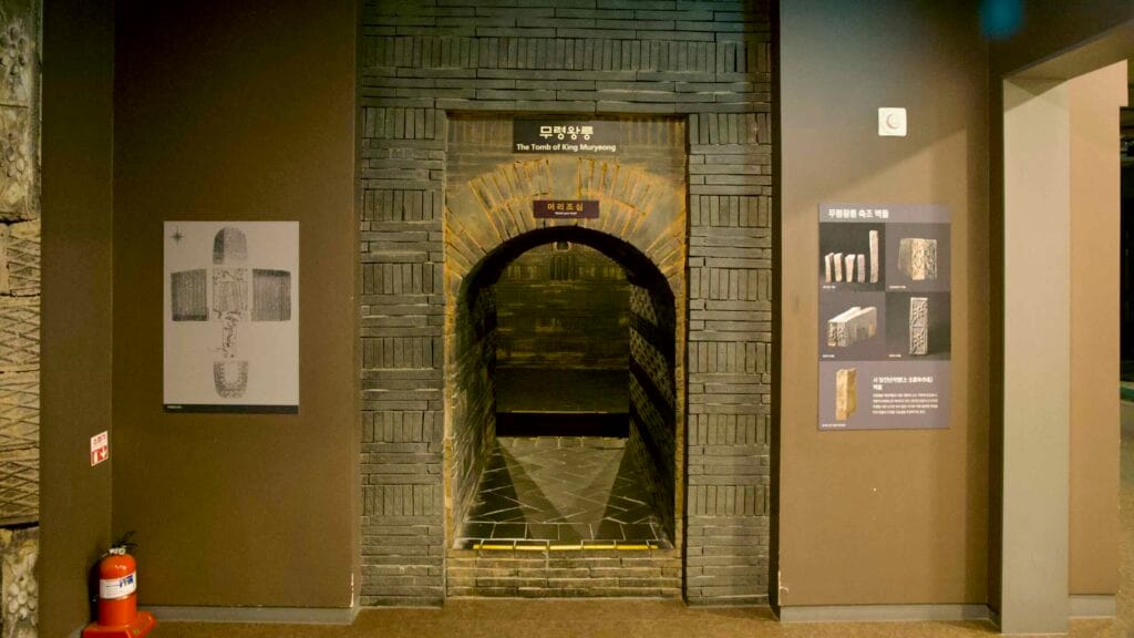 Brick archway to the reconstructed Tomb of King Muryeong, with interpretive diagrams.