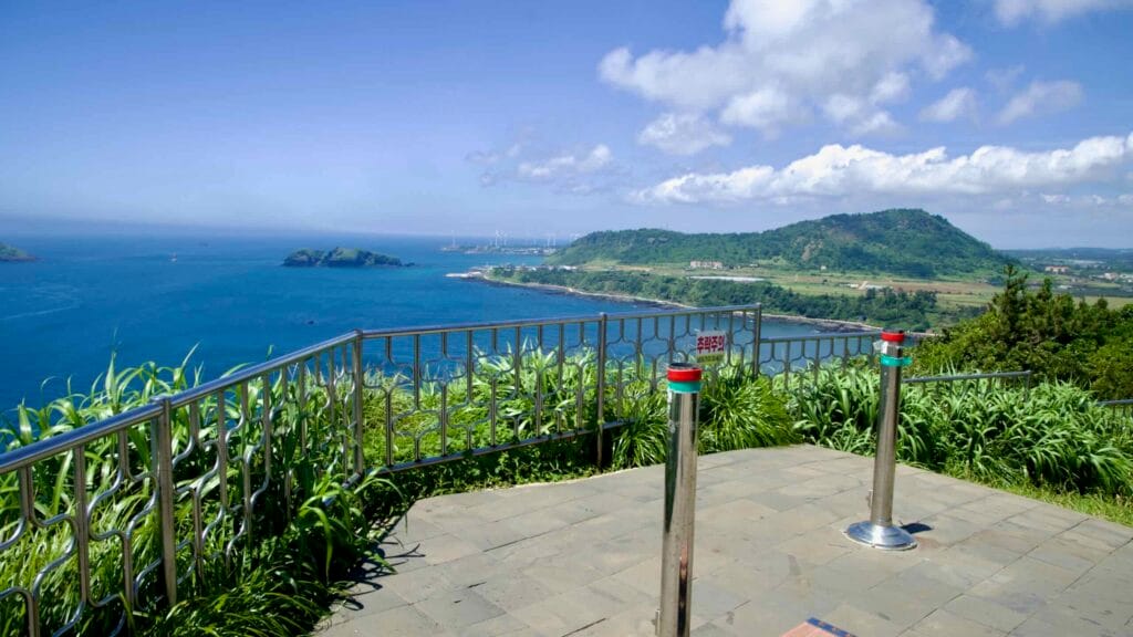 Coastal overlook on Suwolbong with views toward Chagwido and offshore wind turbines.