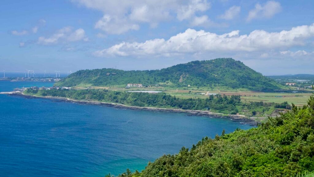 Dangsanbong and Albong with farms and shoreline below Suwolbong.