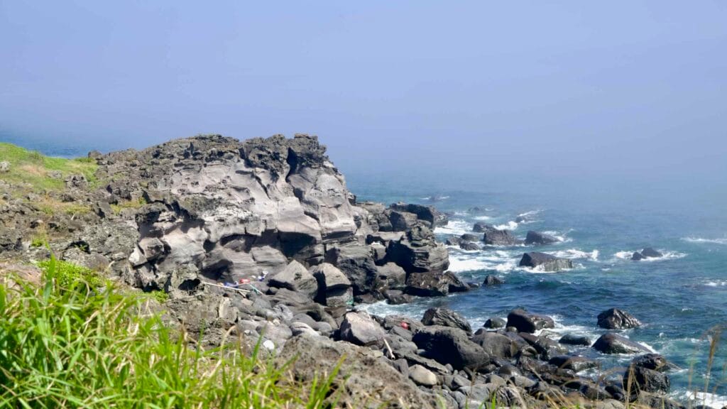 Basalt cliffs and tide pools along the Yeongnak coast near Dogurial.