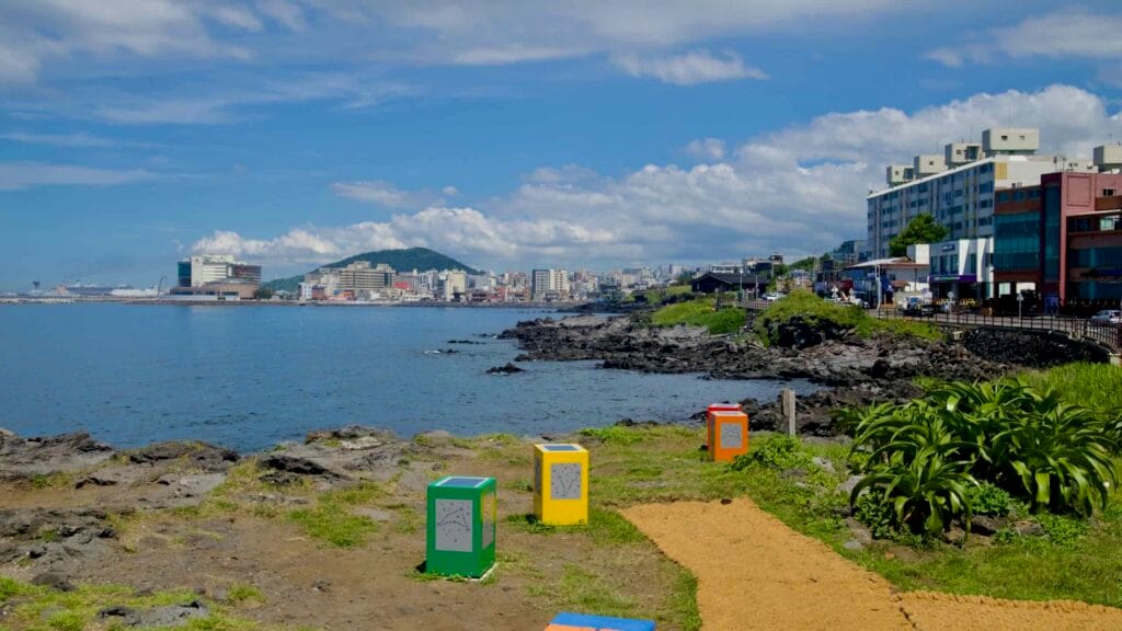 View toward Jeju City from the Hagu‑Aewol shoreline.
