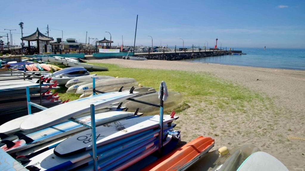 Stacks of surfboards near the Iho pier.