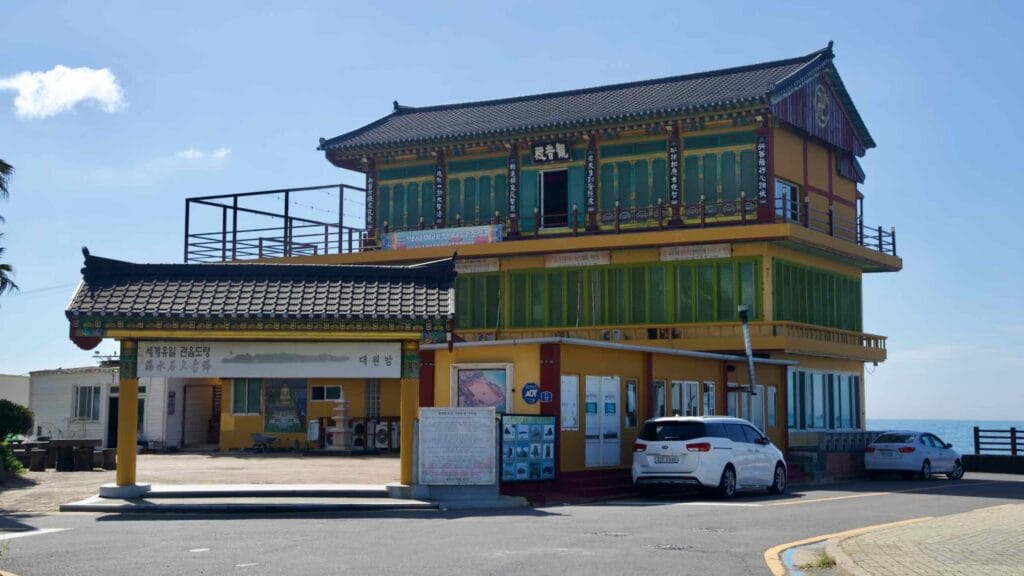 Entrance of Daewonam temple building by the coast.