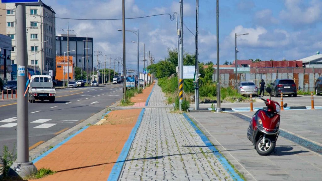 Sidewalk and cycle path beside the coastal road near Hanlim.