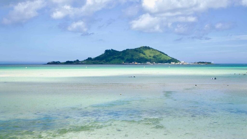Clear lagoon at Geumneung with Biyangdo on the horizon.