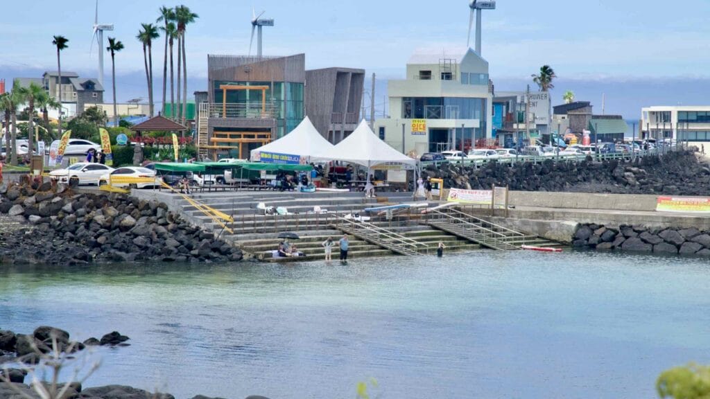 Tents and cafés along the basalt steps at Panpo Port.