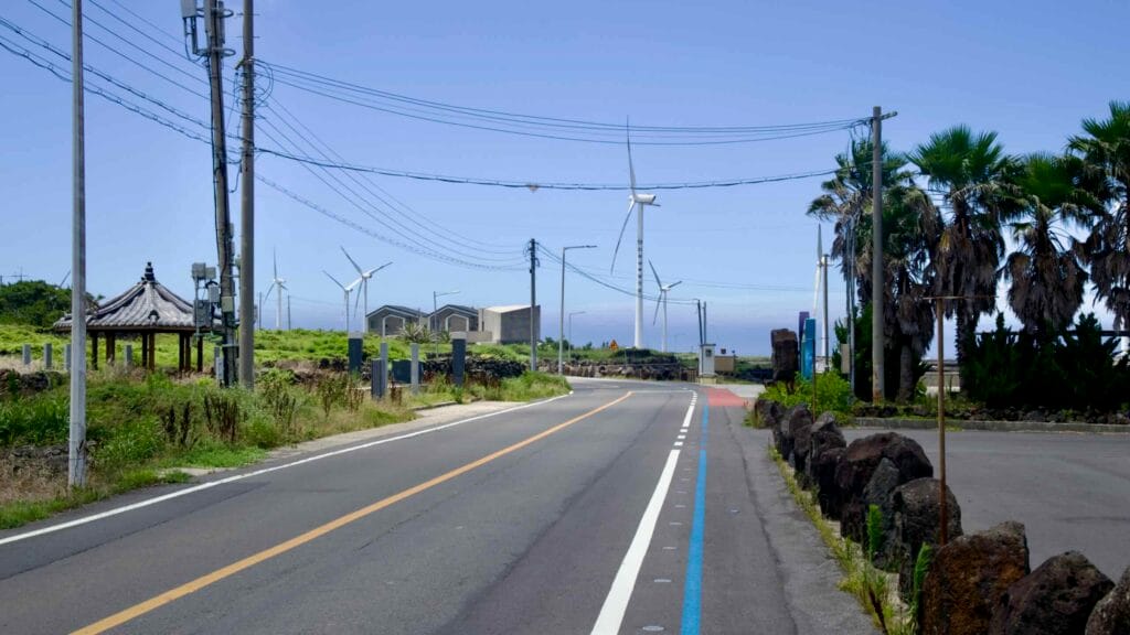 Iljuseo Road with blue bike lane and turbines near Sinchang.