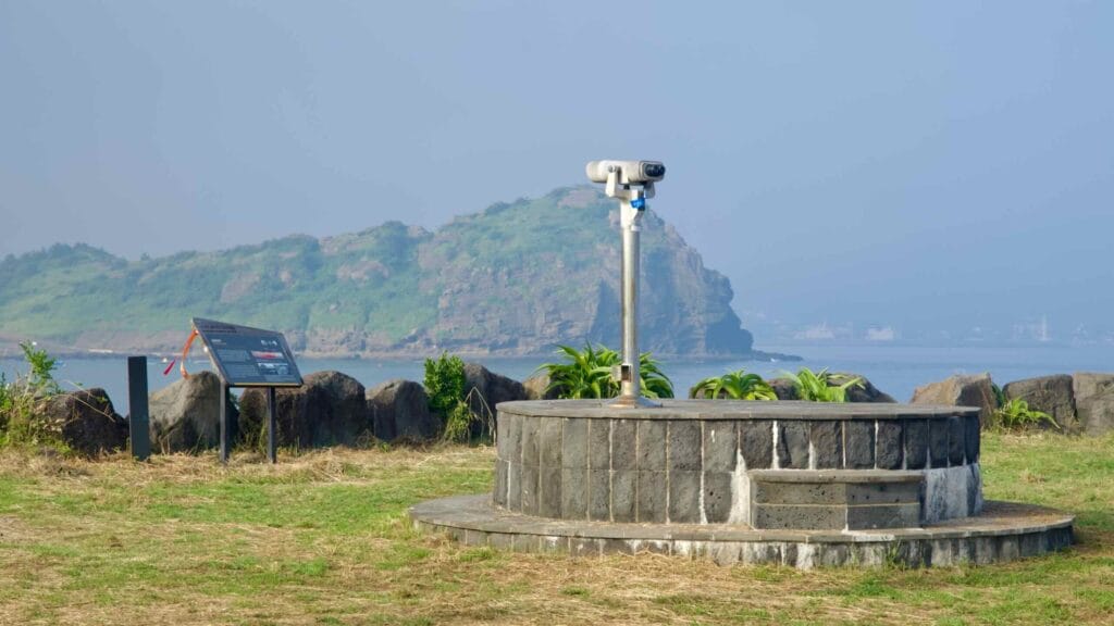 Viewing scope aimed toward Yongmeori Coast from the Geo Trail.