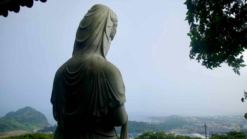 A Bodhisattva gazes over the Sagye coastline from Bomunsa Temple.