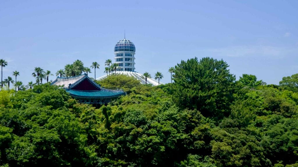 Yeomiji’s glass dome and Cheonjeru Pavilion over a sea of green.