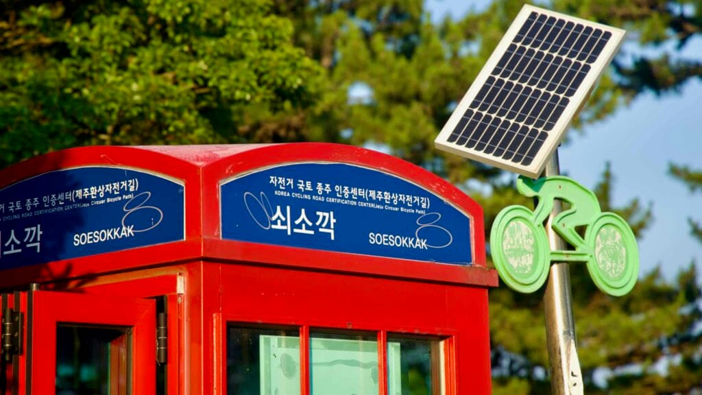 Close view of the Soesokkak certification booth signage and solar panel.