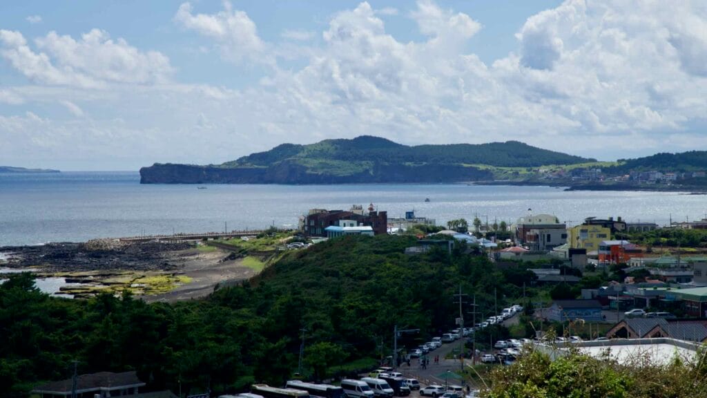 Distant view of Songak Mountain from Jeju’s southwest coast.