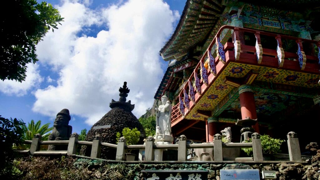 Rows of small stone disciple statues line steps near Bomunsa Temple on Sanbangsan Mountain.