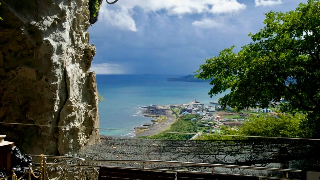 Overlook from Sanbanggulsa Temple toward the coast and red lighthouse.