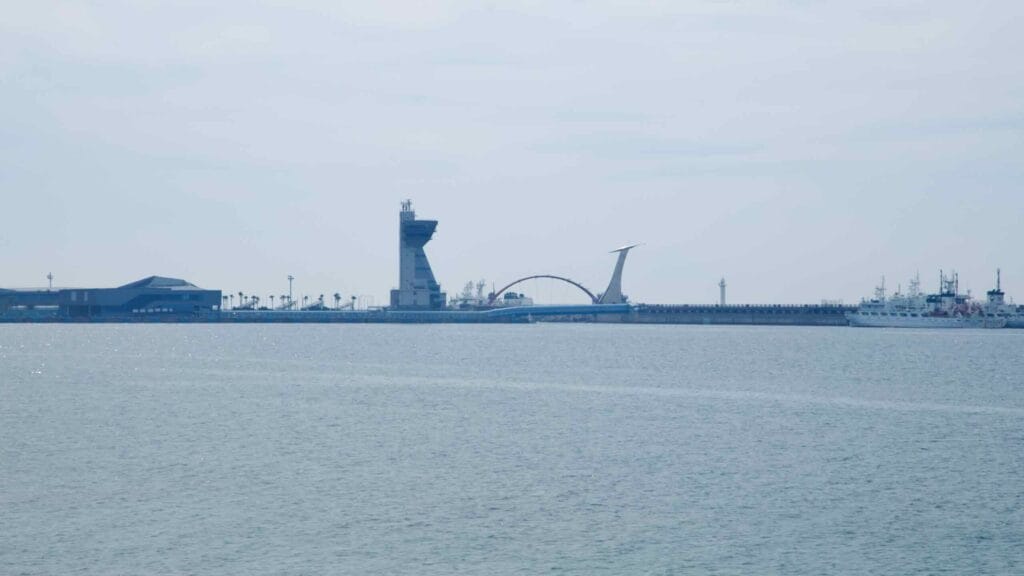 Jeju Harbor’s control tower viewed across the bay from Samyang–Hwabuk.