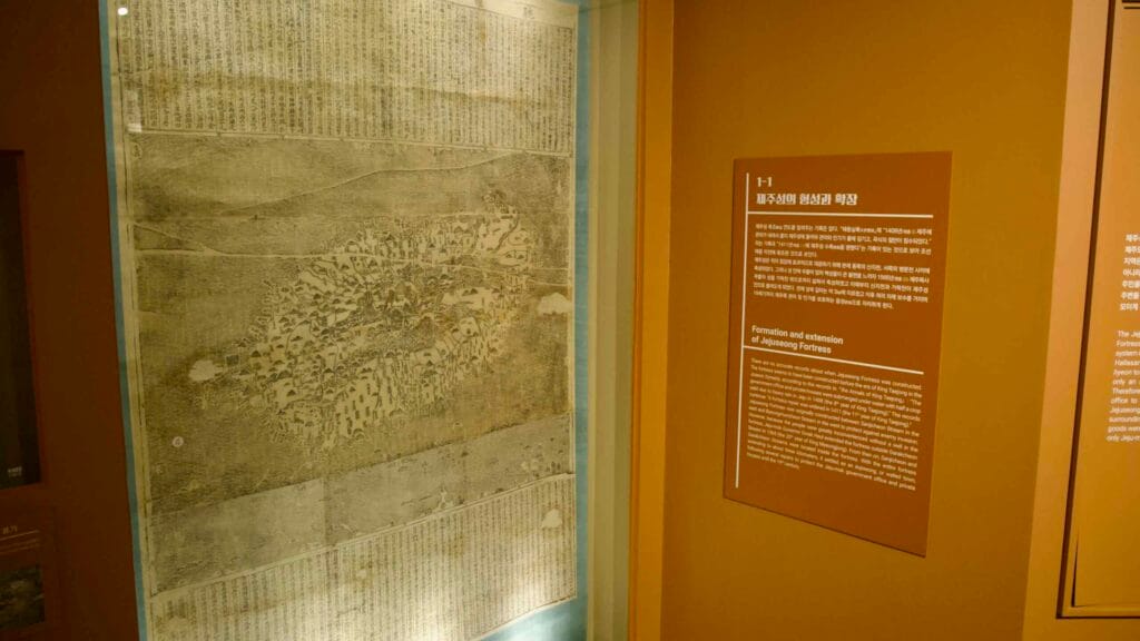 Inside, a large historic map and panel explain the formation and extension of Jeju fortress.