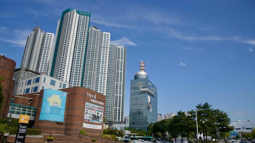KBS’s glass tower and surrounding high-rises overlook a busy downtown area in Chuncheon.
