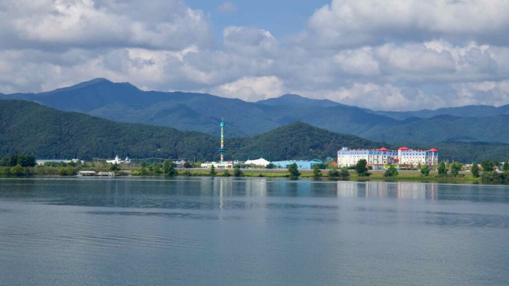 Across Lake Uiam, Hajung Island holds Legoland Korea’s rides, tower, and hotel complex above the shore.