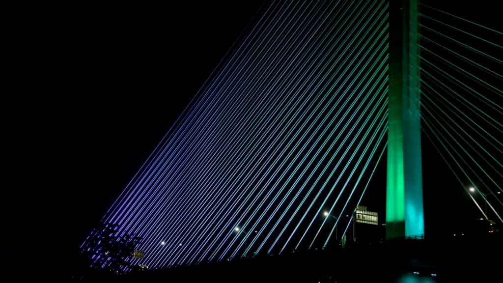A close view shows the Guri-Amsa Bridge tower and its harp-pattern cables.