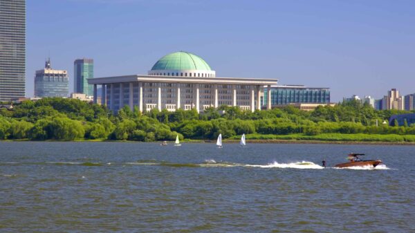 A picture of the National Assembly Building (국회의사당) and the Han River in Yeouido Hangang Park (여의도한강공원) in Seoul, South Korea.