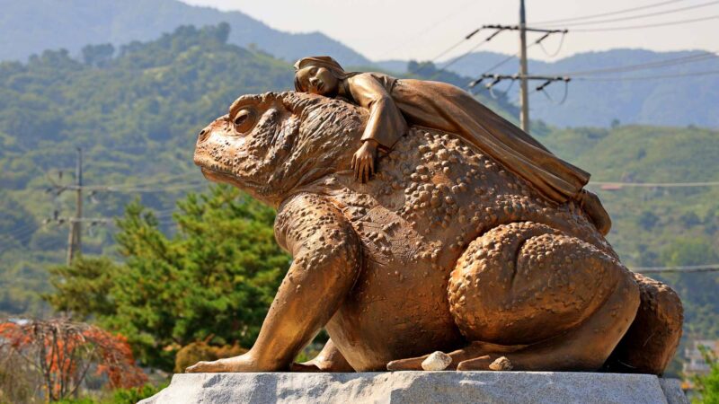 Seomjingang Bike Path - Gokseong Gwangyang - Girl on Frog Statue near Maehwa Village